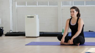 Pilates mat instructor teaching a practical course