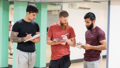 Personal training course students learning together