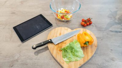 Nutrition Coach prepping a salad