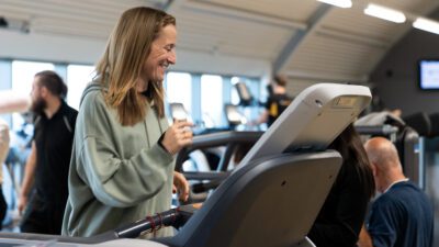 Personal training client on a treadmill